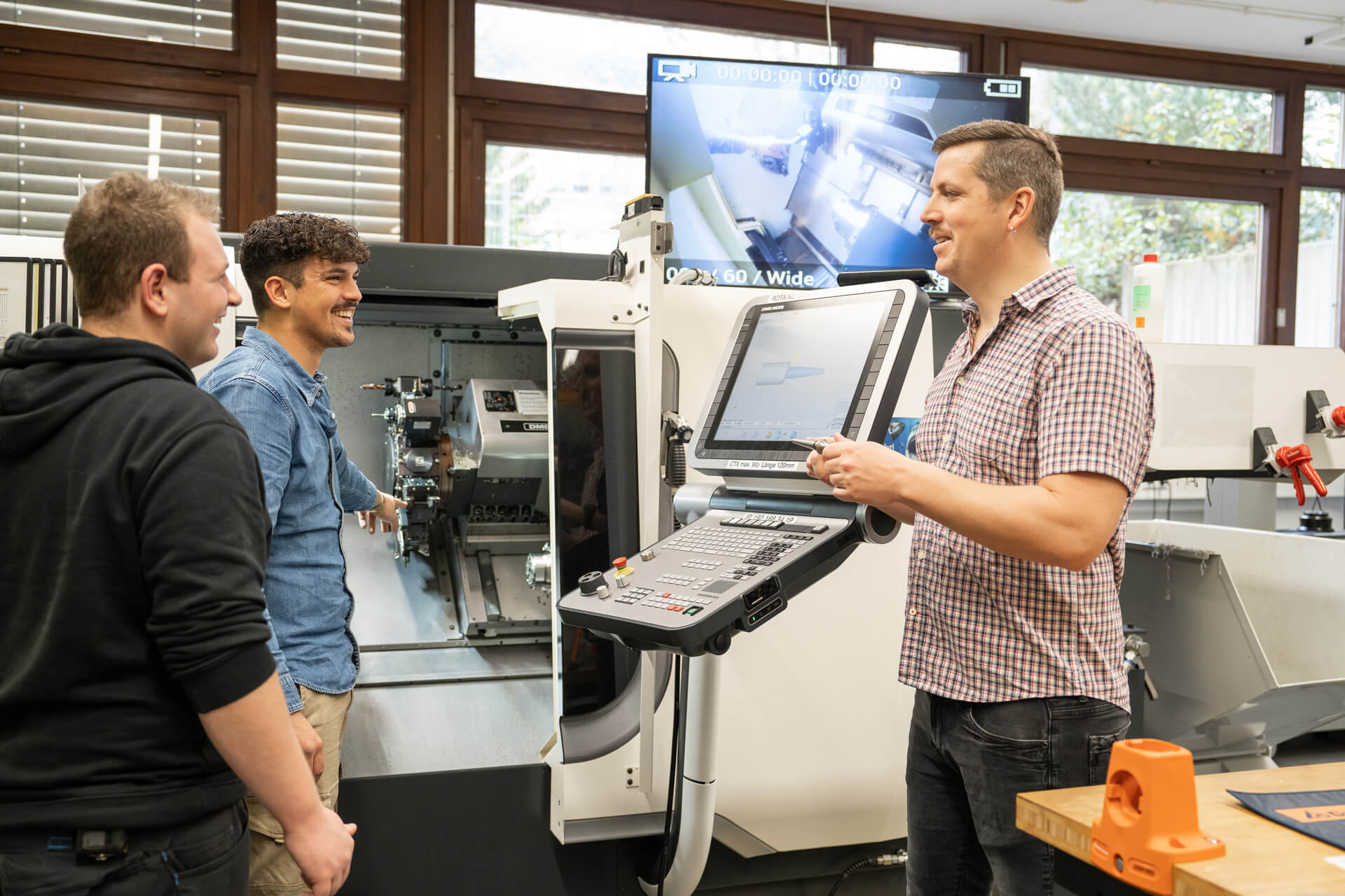 SolidCAM instructor working with students